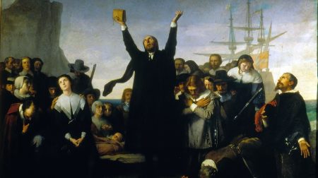 Artwork titled, "Desembarco de los puritanos en América," depicting the landing of the Puritans in America in 1620.