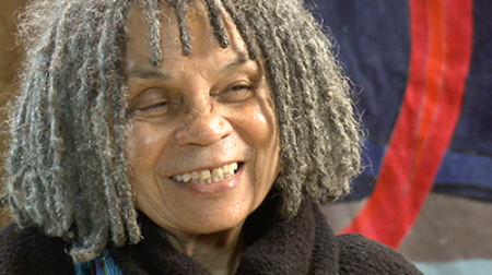 Portrait of Sonia Sanchez smiling.