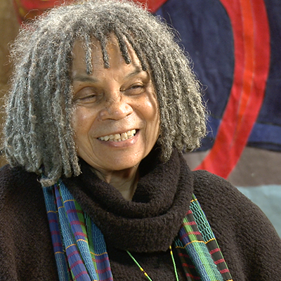 Portrait of Sonia Sanchez smiling.