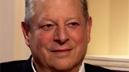 Portrait of Al Gore smiling.