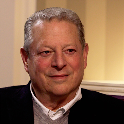 Portrait of Al Gore smiling.