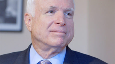 Portrait of John McCain wearing a suit