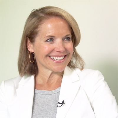 Portrait of Katie Couric smiling.