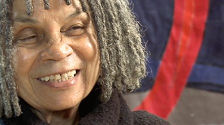 Portrait of Sonia Sanchez smiling.