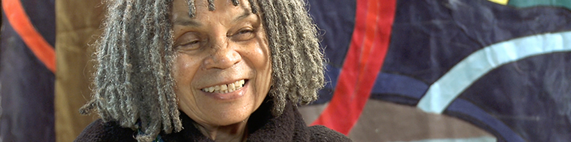 Portrait of Sonia Sanchez smiling.