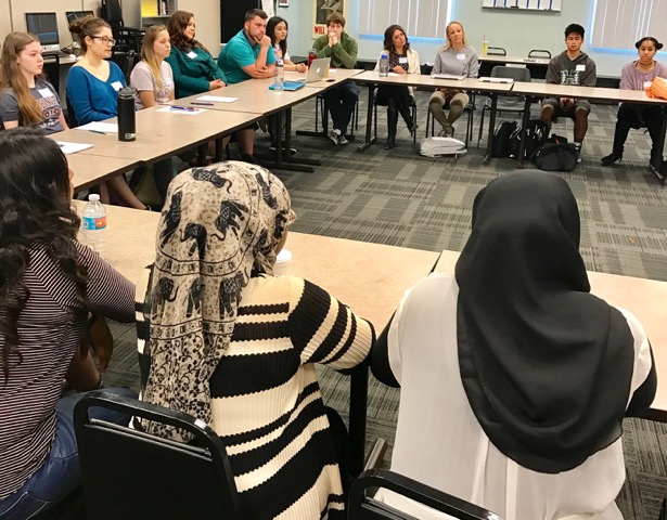 Khriseten Bellows's high-school students discuss a poem during their Poetry in America class