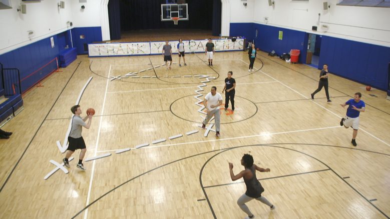 Bird's-eye view of a fast break.