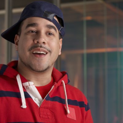 Portrait of Rob Markman smiling.