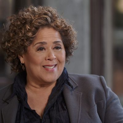 Portrait of Anna Deavere Smith smiling.