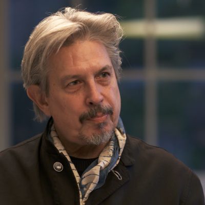Portrait of Eliot Goldenthal looking to the right.