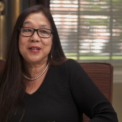 Portrait of Marilyn Chin in mid-speech.