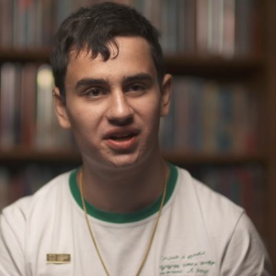 Portrait of 2018 National Student Poet, Daniel Blokh, in the middle of speaking.