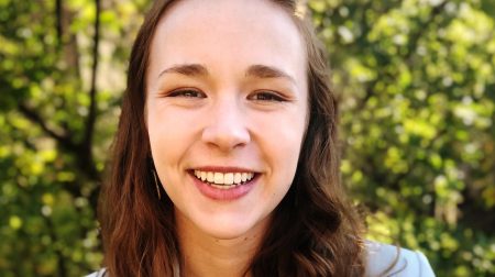 Headshot of Faith Padgett smiling.