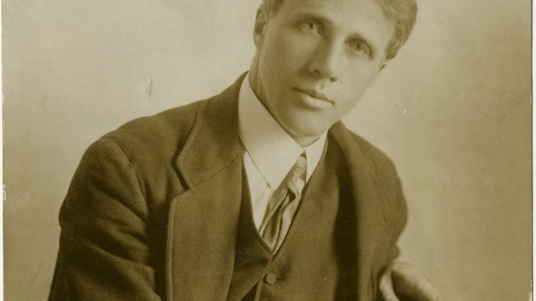 Portrait of Robert Frost in a suit in the 1910s.