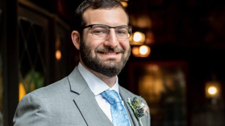 Portrait of Matt Freund wearing a suit while smiling